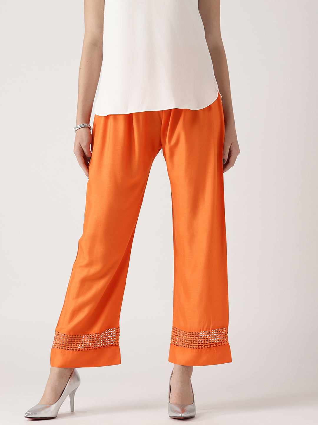 Libas Women Orange Solid Straight Palazzos Price in India