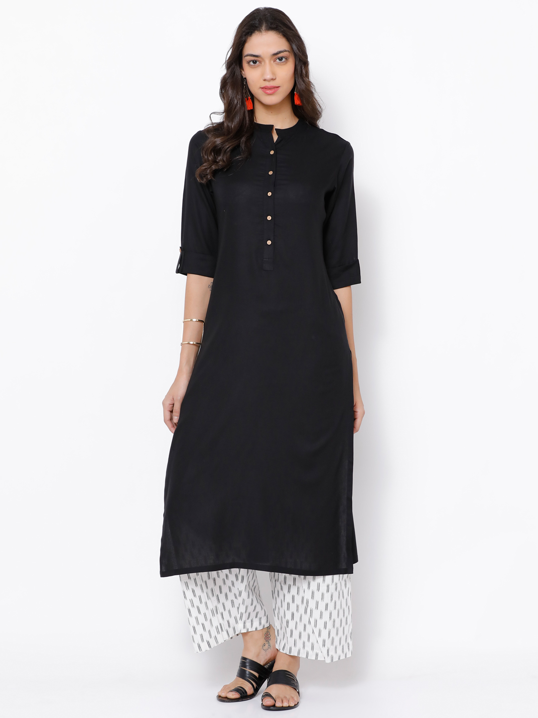 Vishudh Women Black Solid Straight Kurta Price in India