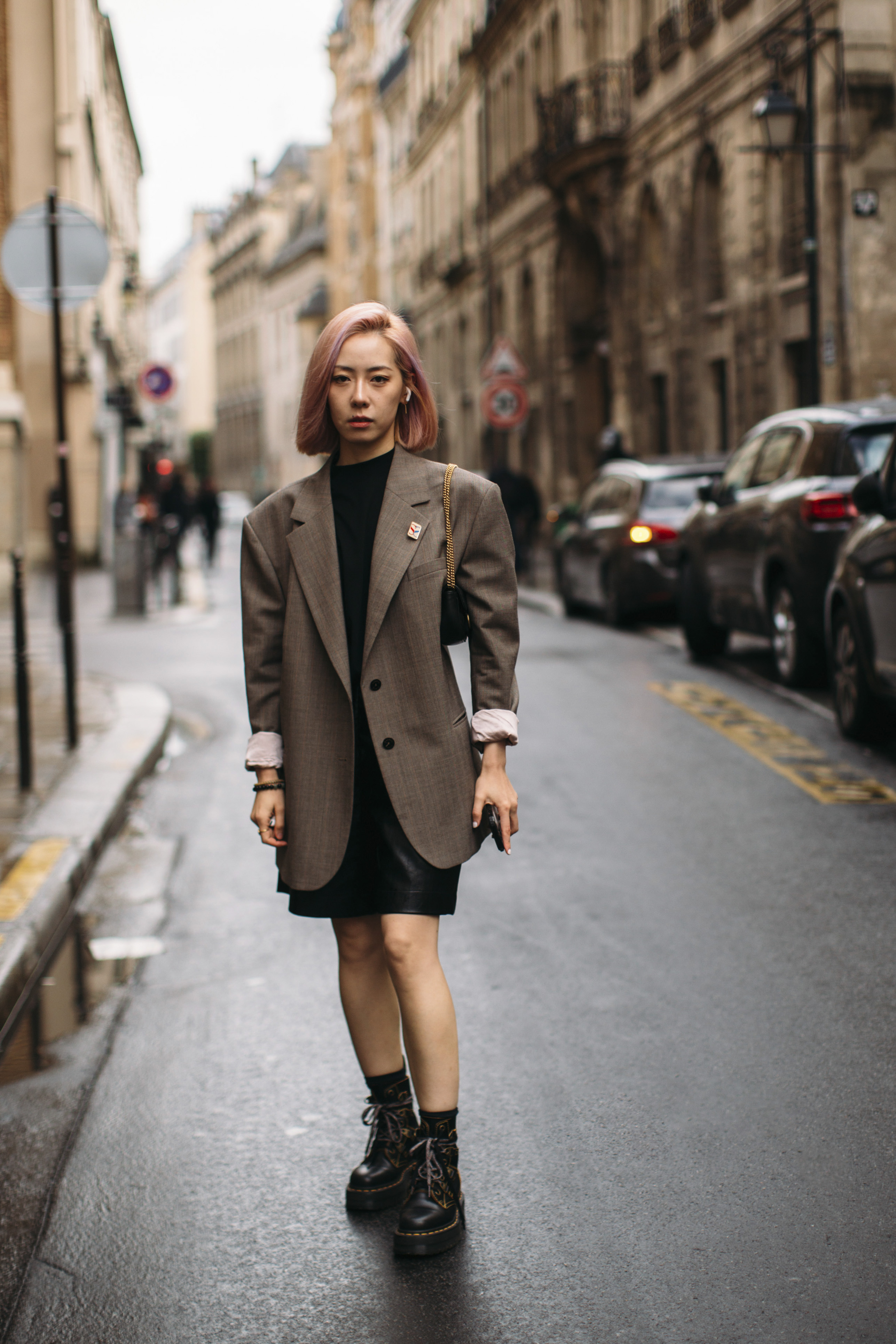 Combining white Dr. Martens with a trench coat