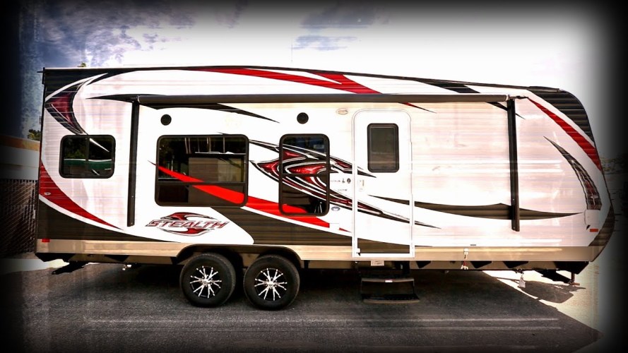 luxe travel trailer with a fuel station
