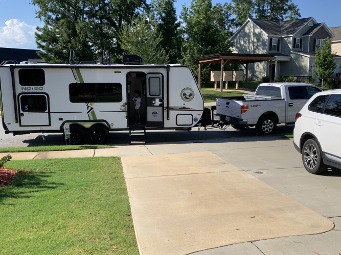 comfortable rv with a two-way fridge and an outside awning