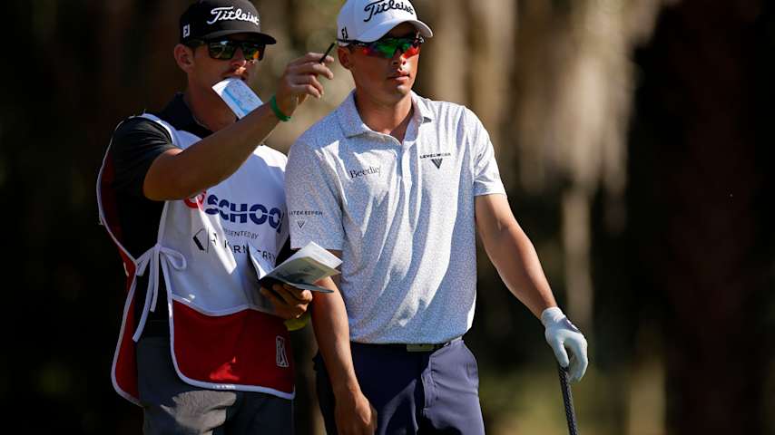 A.J. Ewart of Canada lines up a putt on the first green alongside his caddie during the final round of the Cognizant Classic 2026 at PGA National Resort And Spa on March 01, 2026 in Palm Beach Gardens, Florida. (Mike Ehrmann/Getty Images)