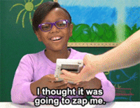 Young girl isn't sure what a Game Boy Original is