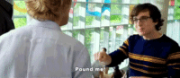 Lyle Spaulding from The Internship, played by Josh Brener, saying "Pound me!" while holding up his fist