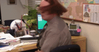 Dwight Schrute from The Office wearing wigs