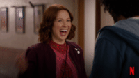 The Unbreakable Kimmy Scmidt giving a very enthusiastic high five