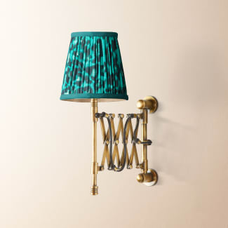 Tina wall fitting in antique brass