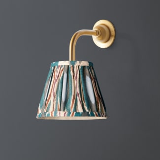 Minnow wall fitting in antique brass