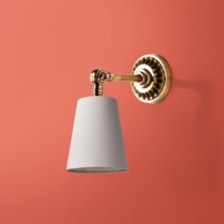 Rose wall fitting in antiqued brass