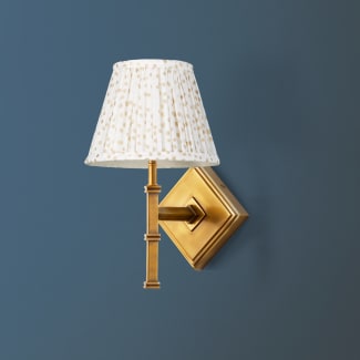 Single Astor wall fitting in antiqued brass