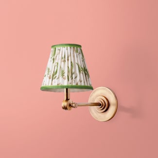 Elbow cordless wall fixture in antique brass