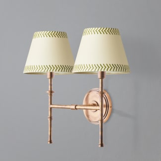 Larger Double chukka wall fixture in antiqued brass