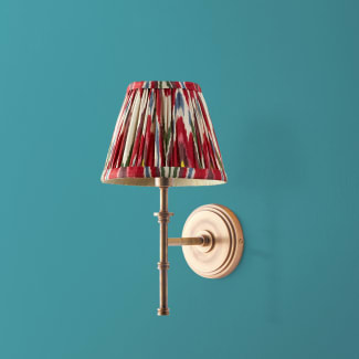Single Chukka Wall fixture in antiqued brass