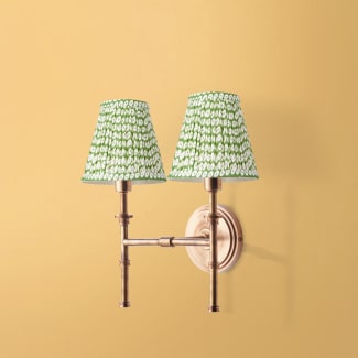 Double Chukka Wall fixture in antiqued brass