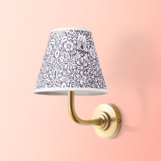 Dinky wall fitting in antique brass