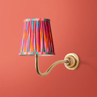 Swan Neck cordless wall fixture in antique brass