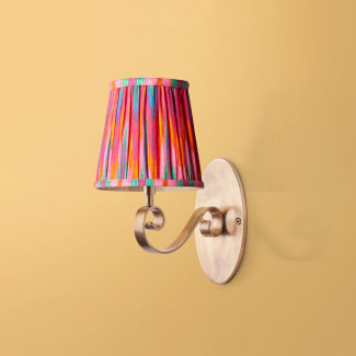 Tagliatelle cordless wall fixture in antique brass