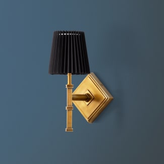 Single Astor wall fitting in antiqued brass