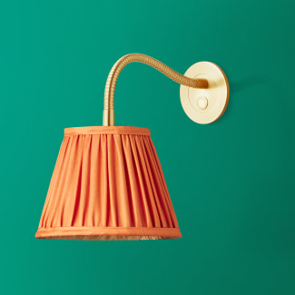 Phoebe flexible wall arm in antique brass