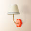Primrose wall fitting in orange lacquered wood