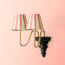 Anthea wall fitting in antique brass and black wood