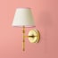 Single Chukka Wall fitting in antiqued brass