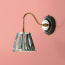 Drake wall fitting in wood and brass