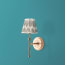 Single Chukka cordless wall fixture in antique brass