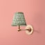 Elbow cordless wall fixture in antique brass