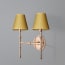 Larger Double chukka wall fixture in antiqued brass