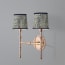 Larger Double chukka wall fixture in antiqued brass
