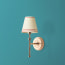 Single Chukka Wall fixture in antiqued brass