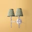 Double chukka wall fixture in antiqued silver