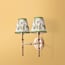 Double Chukka Wall fixture in antiqued brass