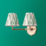 Double Insignia cordless wall fixture in antique brass