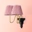 Anthea wall fitting in antique brass and black wood