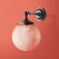 Rose wall fitting in antiqued bronze