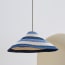 Conical basket pendant shade in beachfront
