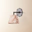 single insignia wall fitting in bronze