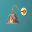 Lissome wall fitting in antiqued brass