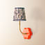 Primrose wall fitting in orange lacquered wood