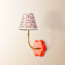Primrose wall fitting in orange lacquered wood