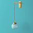 Swinger wall fitting in antiqued brass
