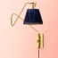 Cooper Wall Fitting in Antique Brass
