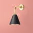 Dinky wall fitting in antique brass
