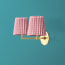 double insignia wall fitting in antique brass