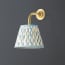 Minnow wall fitting in antique brass