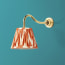 Swan neck wall fitting in antiqued brass