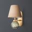 Tiddly Pomme wall fitting in brass and green glass