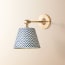 Elbow wall fitting in antiqued brass